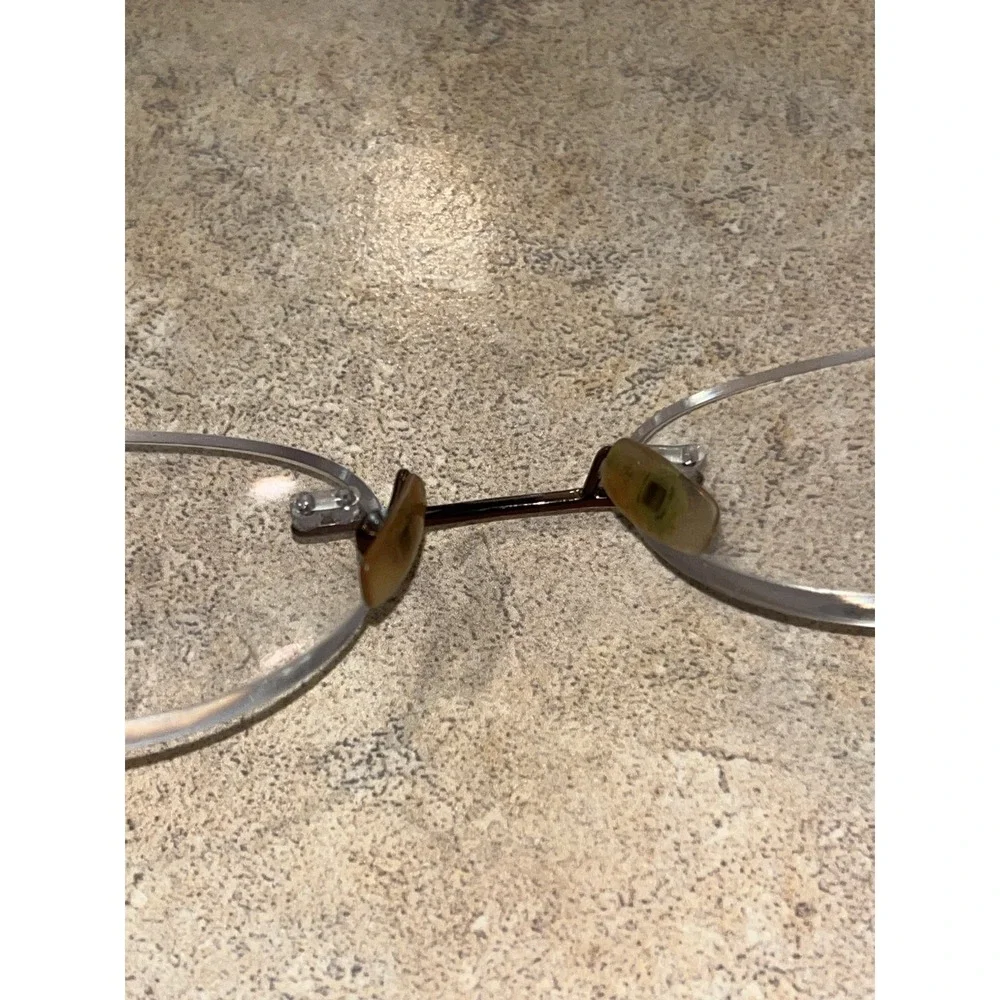 Vera Wang Capella 1 Titanium BR Brown Rimless Oval Womens Eyeglasses 50-18-133‎